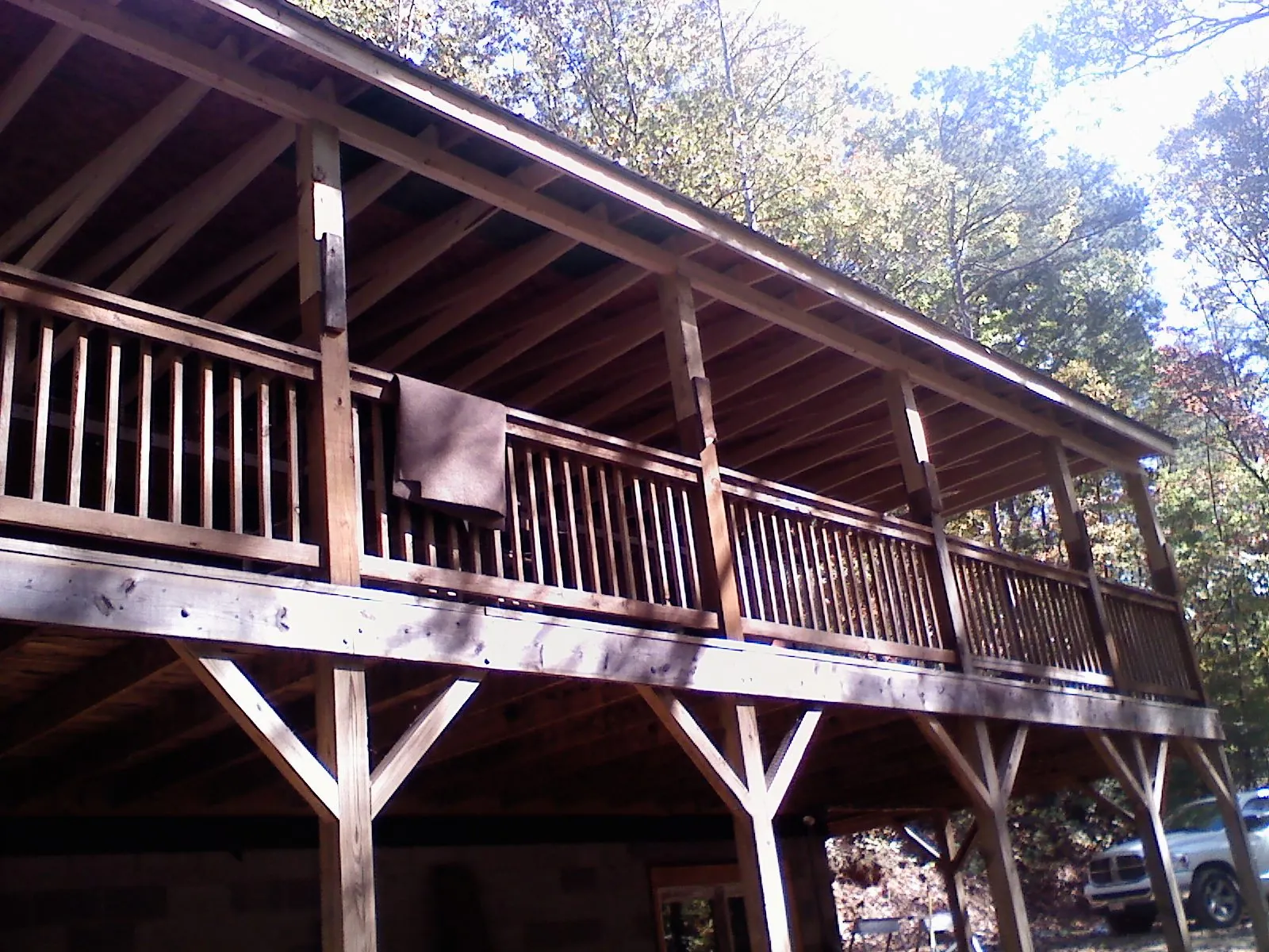 Timber framing under a new elevated porch and deck — Roof Leak Repair in Bohemia by Roofing Brothers